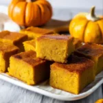 Freshly baked one-bowl Pumpkin Pie Butter Mochi on tray