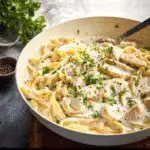 One Pot Chicken Alfredo Pasta – Easy Creamy Comfort Food in Minutes 6 One Pot Chicken Alfredo Pasta in creamy sauce with parsley garnish